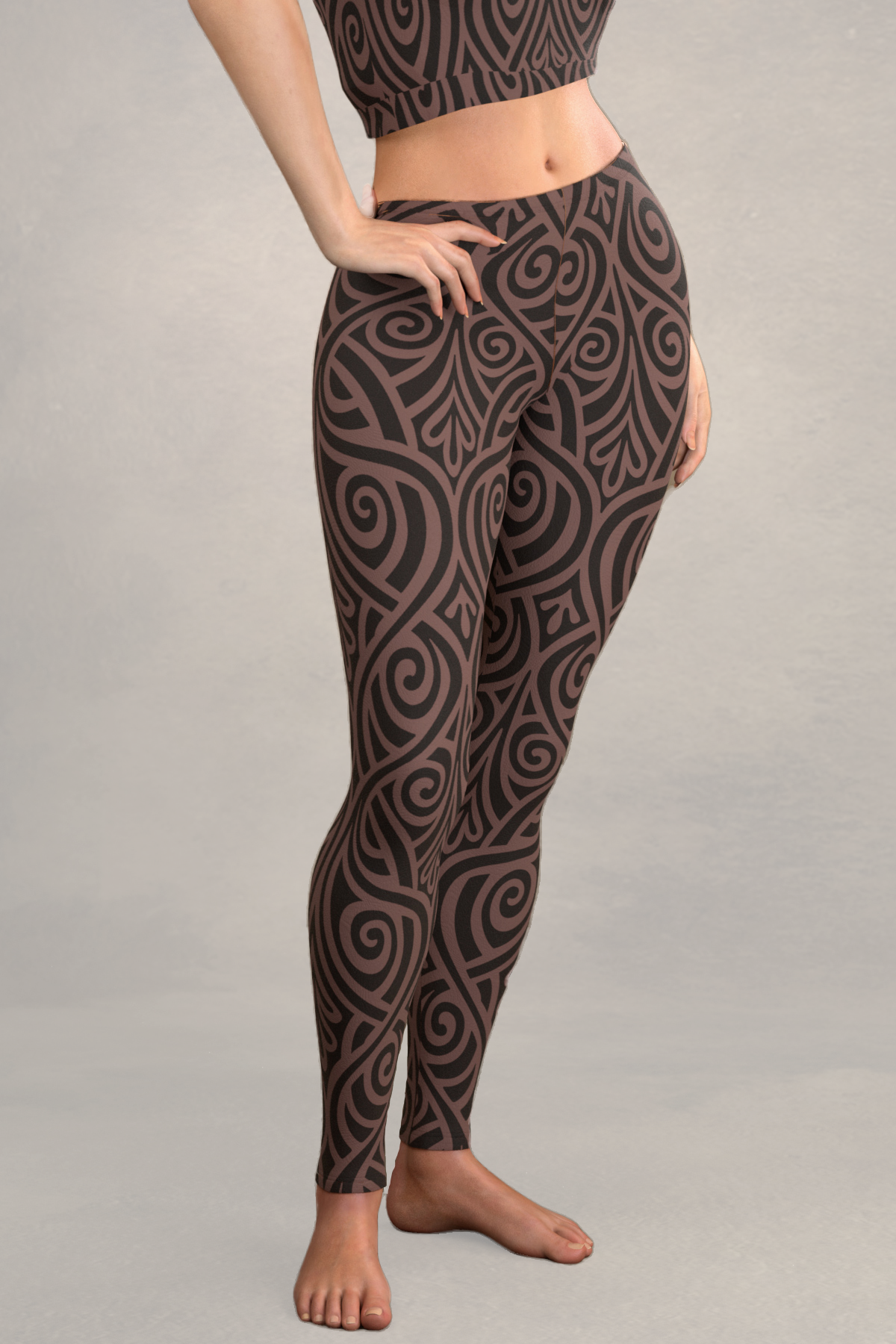 Black and brown floral printed leggings. Polyester spandex blend
